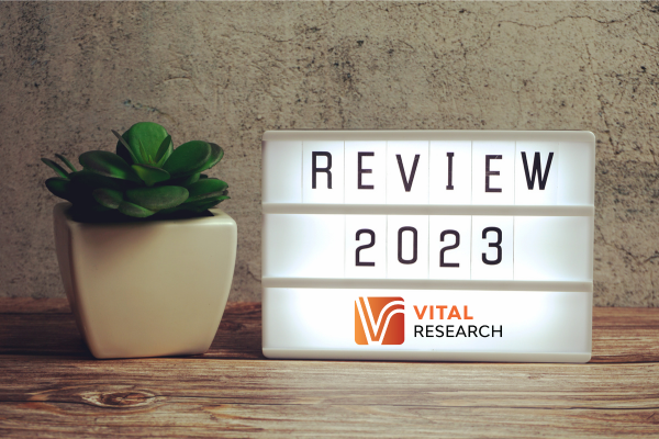 Picture of a sign that says Review 2023 with the Vital Research Logo